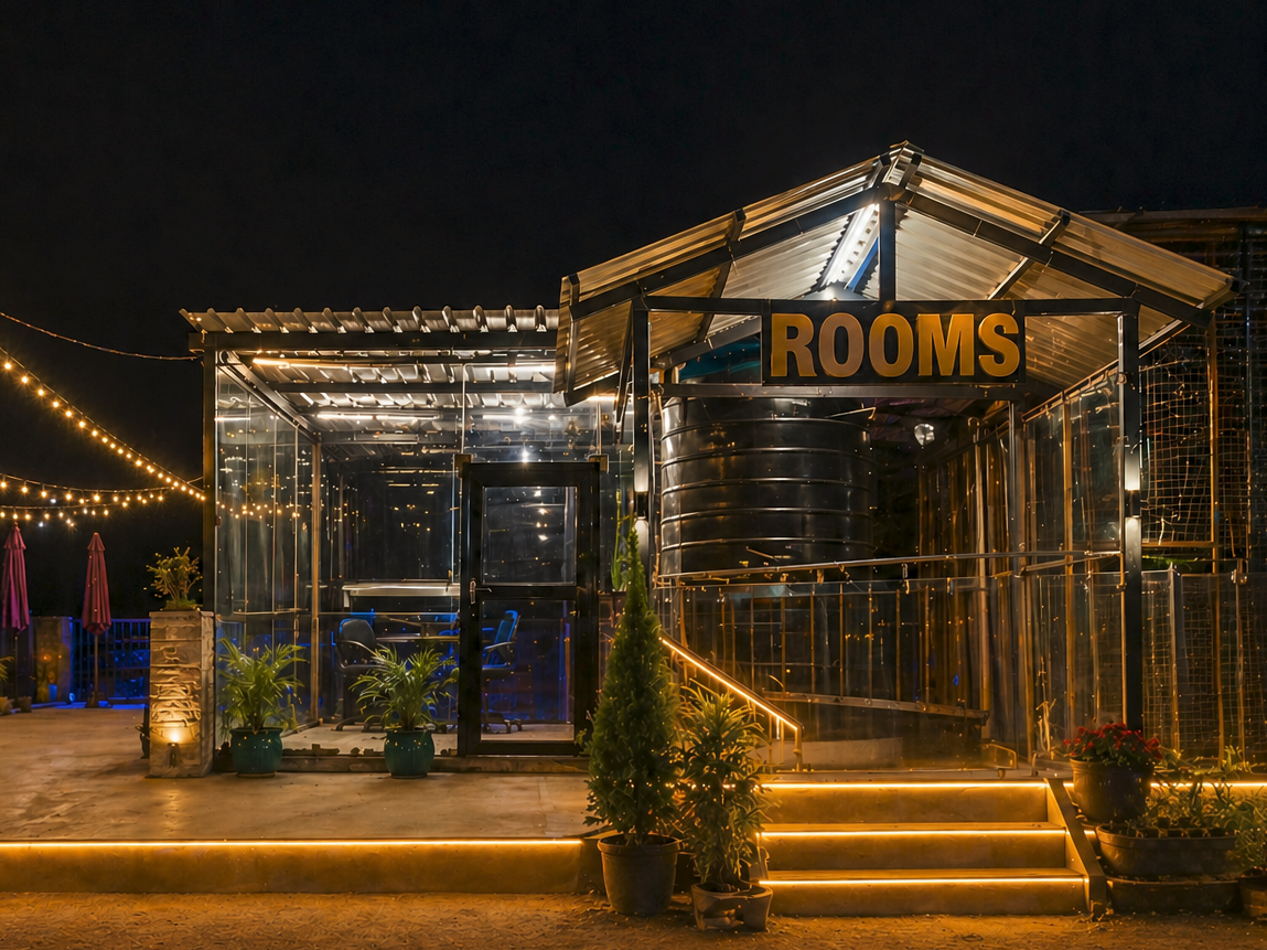 Front view of Shubh Inn hotel at night