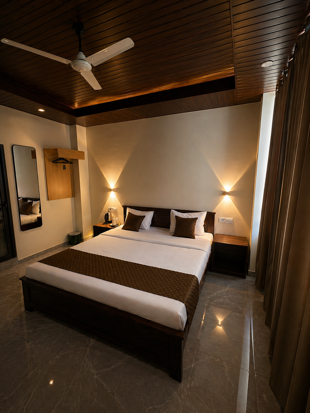 Warm Shubh Inn guest room with wooden ceiling and double bed
